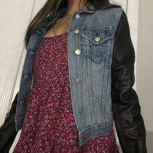 Jean jacket with leather sleeves
